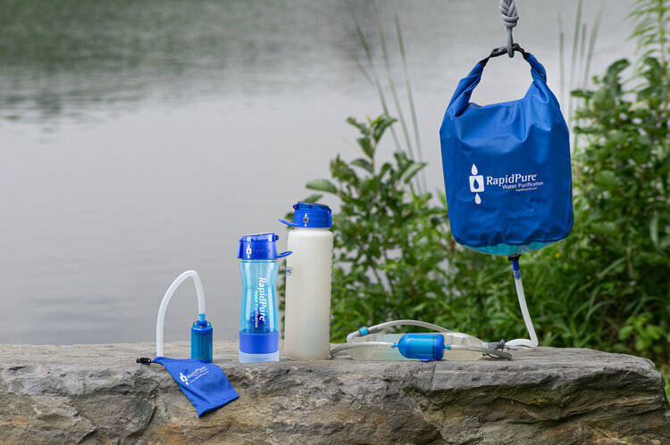 RapidPure+Family+on+Rock+by+Water.jpg